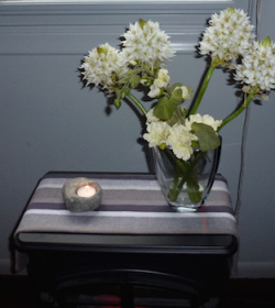 Gray-dation towel on the faux fireplace