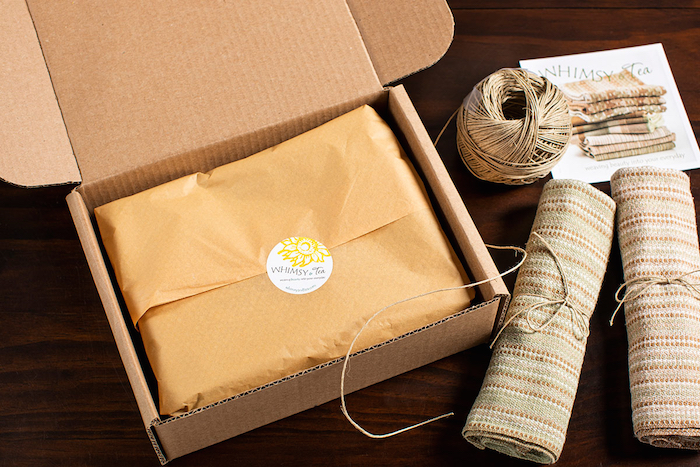 Environmentally conscious choices at Whimsy & Tea: recycled and recyclable packaging, postcards, towels made from sustainably grown colorgrown cotton.